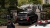 A vehicle drives onto the property of Gracie Mansion, the official residence of New York City Mayor Eric Adams, Sep. 26, 2024, in New York.