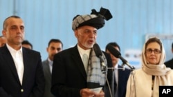 FILE - Afghan President Ashraf Ghani speaks to journalists in Kabul, Afghanistan, Sept. 28, 2019.