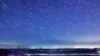 FILE - A meteor streaks past stars during the Quadrantid meteor shower in Qingdao, Shandong province, Jan. 4, 2014, in this photo taken with a long exposure. 