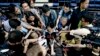 The Houston Rockets' Jeremy Lin is interviewed by a horde of reporters during a break in his team's practice at the Mall of Asia Arena at suburban Pasay city, south of Manila, Philippines, Oct. 8, 2013. 