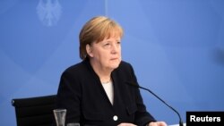德国总理默克尔5月5日在柏林出席二战结束“解放日”的纪念活动。