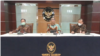Menko Polhukam Mahfud MD saat menggelar konferensi pers di Jakarta, Jumat (11/6). (Foto: VOA/Sasmito Madrim)