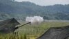 FILE - A U.S .155mm Howitzer fires a round during annual combat drills between the Philippine Marine Corps and U.S. Marine Corps in the northern Philippines, Oct. 13, 2022. Filipino and U.S. troops will kick off joint military exercises in the Philippines on Monday.