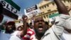 A group of Sri Lankan Muslims shout slogans, protesting against the UN and U.S resolution against Sri Lankan war crimes, during a demonstration as they march towards U.S embassy in Colombo, March 26, 2014. 