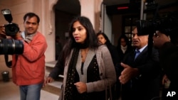 FILE - Devyani Khobragade, who served as India’s deputy consul general in New York, leaves Maharastra state house in New Delhi, Jan. 11, 2014.