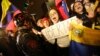 Venezuelans living in Peru protest outside the Venezuela embassy in Lima, demanding a referendum to remove Venezuela's President Nicolas Maduro, Sept. 1, 2016. 