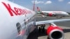 FILE - Kenya Airways planes are seen parked at the Jomo Kenyatta International Airport near Nairobi, Nov. 6, 2019. 