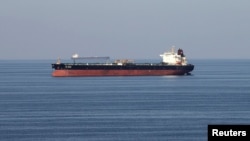 FILE - Oil tankers pass through the Strait of Hormuz, Dec. 21, 2018. 
