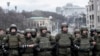 Police try to block supporters of former Georgian president Mikheil Saakashvili during a rally in Kyiv, Ukraine, Dec. 5, 2017.