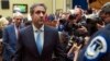 FILE - Michael Cohen, President Donald Trump's former attorney, departs after testifying before the House Oversight and Reform Committee, on Capitol Hill, Feb. 27, 2019, in Washington. 