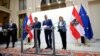 FILE - From left: Austrian Chancellor and head of the People's Party Karl Nehammer, head of the Social Democrats Andreas Babler and head of NEOS party Beate Meinl-Reisinger announce the start of coalition negotiations in Vienna, Nov. 18, 2024