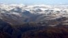 FILE - The Himalayan range is seen in this aerial view taken from an aircraft flying over Nepal. In background is the Tibetan Plateau. 