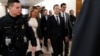 Facebook CEO Mark Zuckerberg walks to a meeting with Senator John Thune (R-SD) on Capitol Hill in Washington, April 9, 2018. 