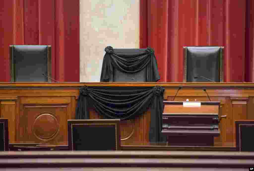 Supreme Court Justice Antonin Scalia&rsquo;s courtroom chair is draped in black to mark his death as part of a tradition that dates to the 19th century, at the Supreme Court in Washington, D.C. Scalia died at age 79. He joined the court in 1986 and was its longest-serving justice.