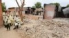School pupils play in Maiduguri Experimental School, a private nursery, primary and secondary school burnt by the Islamist group Boko Haram to keep children away from school in Maiduguri, northeastern Nigeria, May 12, 2012. 