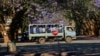 A truck carrying police officers on a street in Harare, Oct, 19, 2020.