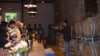 Visitors learn about wine at the tasting room of Sula Vineyards in Nashik, Maharashtra, India. (Anjana Pasricha for VOA)