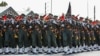 FILE - Members of Iran's Islamic Revolutionary Guard Corps (IRGC) march in a military parade in this handout photo provided by the Iranian presidency on Sept. 22, 2019. 