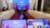 Vietnam's Deputy Prime Minister and Foreign Minister Pham Binh Minh chats in a video meeting with Chinese State Councillor Wang Yi and other leaders during the ASEAN-China ministerial meeting in Hanoi, Sept. 9, 2020. (ASEAN Vietnam 2020 via Reuters)