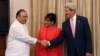 U.S. Secretary of State John Kerry (R) shakes hands with India's Finance Minister Arun Jaitley as U.S. Commerce Secretary Penny Pritzker (C) watches before the start of their meeting in New Delhi, July 31, 2014.