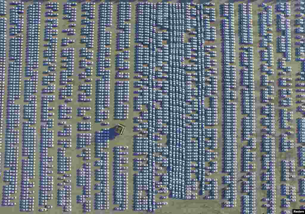 An aerial view shows new Audi cars in an open-air parking lot in Changchun, Jilin province, China.