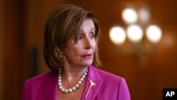 House Speaker Nancy Pelosi, D-Calif., attends a bill enrollment for funding crime victims, at the Capitol in Washington, July 21, 2021. Earlier, Pelosi rejected two Republicans nominated to serve on a panel probing the Jan. 6 Capitol insurrection.