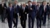 Russian President Vladimir Putin, center, visits a new power plant in Crimea, part of Moscow's efforts to upgrade the region's infrastructure in Sevastopol, Crimea, March 18, 2019. 
