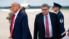 FILE - President Donald Trump and Attorney General William Barr arrive at Andrews Air Force Base, Maryland, Sept. 1, 2020.