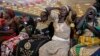 iyayen 'yan matan Chibok a wata ganawa da Shugaba Muhammadu Buhari a villa, Abuja, Nigeria, January 14, 2016 REUTERS/Afolabi Sotunde - RTX22DYM
