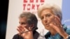 International Monetary Fund (IMF) Managing Director Christine Lagarde (R) and IMF First Deputy Managing Director David Lipton hold a news conference at the annual meetings of the International Monetary Fund and the World Bank Group in Tokyo October 11, 20