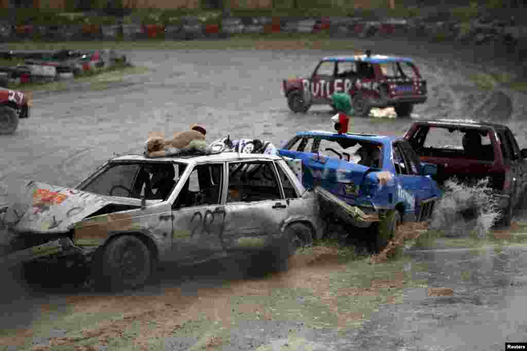 Drivers take part in a demolition derby organized by the Malta Motor Sports Association to raise funds for charity, in Ta&#39; Qali, outside Valletta, Malta, Dec. 20, 2015.