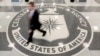FILE - A man walks through the lobby of CIA headquarters in Langley, Virginia, Aug. 14, 2008. On Wednesday, the agency posted online instructions in Korean, Mandarin and Farsi detailing steps potential informants could safely take to contact U.S. intelligence officials.