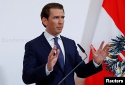 Austrian Chancellor Sebastian Kurz talks to reporters in Vienna, May 18, 2019.