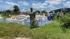 Women leave after receiving food aid from the World Food Program in Nyamapanda district, Zimbabwe, Feb. 2020. (Columbus Mavhunga/VOA)