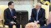 South Korea's national security chief Chung Eui-yong briefs U.S. President Donald Trump at the Oval Office about his visit to North Korea, in Washington, March 8, 2018.