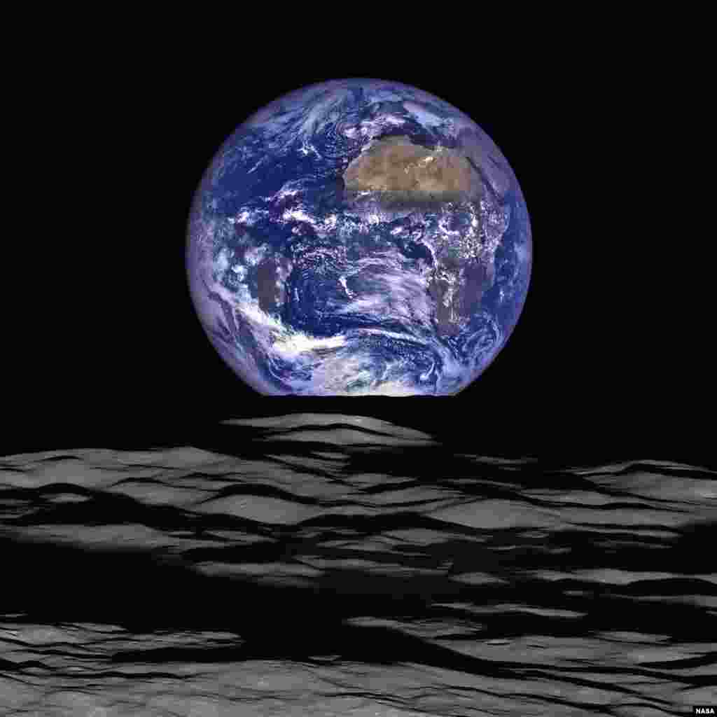 An image released Friday from NASA's Lunar Reconnaissance Orbiter (LRO) shows a view of Earth from the spacecraft's vantage point in orbit around the moon. Earth appears to rise over the lunar horizon, with the center of the Earth just off the coast of Liberia (at 4.04 degrees North, 12.44 degrees West) in this composite image. The large tan area in the upper right is the Sahara Desert, and just beyond is Saudi Arabia.
