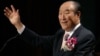 In this Saturday, June 25, 2005 photo, Unification Church leader Rev. Sun Myung Moon speaks during his "Now is God's Time" rally in New York.