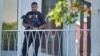 An officer patrols outside the courthouse where Ryan Wesley Routh, suspected in an apparent assassination attempt of former President Donald Trump, will attend a hearing, in West Palm Beach, Florida, Sept. 23, 2024. Routh's son has been arrested on child sexual abuse charges.