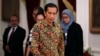 Presiden Joko Widodo di istana presiden (21/10). (Reuters/Darren Whiteside)