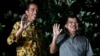 Pasangan Presiden dan Wapres terpilih Joko Widodo (kiri) dan Jusuf Kalla saat memberikan keterangan pers terkait keputusan MK di Jakarta, Kamis malam (21/8).