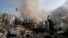 Petugas tanggap darurat memadamkan api yang menyala di lokasi serangan Israel ke Dahiyeh, Beirut, Lebanon, pada 1 November 2024. (Foto: AP/Hassan Ammar)
