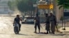 Rebel fighters from the hardline jihadist Jund al-Aqsa man a checkpoint in the Syrian town on Taybat al Imam town on August 31, 2016. 
