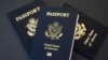In this May 9, 2017 photo, U.S. passports lie on a table in Dallas, Texas. 