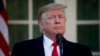 FILE - President Donald Trump announces a deal to temporarily reopen the government, in the Rose Garden of the White House, Jan. 25, 2019, in Washington. 