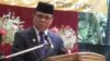 Moro Islamic Liberation Front Chairman Al Haj Murad Ebrahim holds a rare press conference at Camp Darapanan, Philippines, October 27, 2012. (Simone Orendain/VOA)