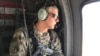 FILE - Then-Lt. Gen. Stephen Townsend flies north of Baghdad, Iraq, Feb. 8, 2017. Now a general and head of U.S. Africa Command, he says the U.S. knows the Chinese "desire a network of bases around the globe."