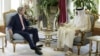 Qatar's Emir Sheikh Tamim bin Hamad al-Thani (R) talks with U.S. Secretary of State John Kerry before their meeting at the Diwan Palace in Doha, Aug. 3, 2015. 