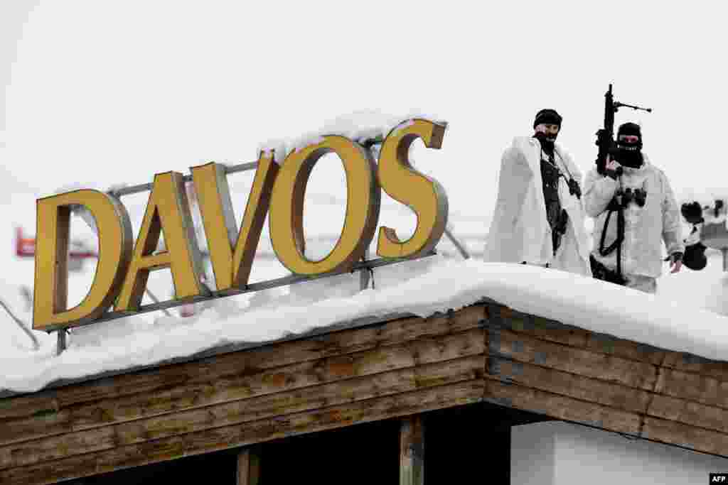 Swiss special police forces take position at the opening of the World Economic Forum (WEF) annual meeting in Davos, Switzerland.