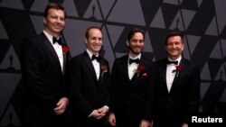 John Lynch (from left), Mark Tucker, Jeff Lait and Cristin Barghiel, recipients of Scientific and Engineering Award for Houdini visual effects and animation system, pose at the Scientific and Technical Awards presented by the Academy of Motion Picture Art and Sciences in Beverly Hills, California, Feb. 10, 2018. 