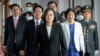 Taiwanese President Tsai Ing-wen, center, walks ahead of Vice-President Lai Ching-te, left of her, as they attend an inauguration ceremony in Taipei, Taiwan, May 20, 2020. 